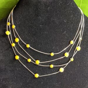 Silvertone Four Strand Adjustable Necklace With Faceted Yellow Cabochons